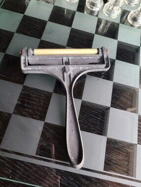 Antique Black Handle Lint Roller with Yellow Roller Head